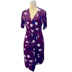 Banana Republic poly/ spandex faux wrap asymmetrical floral jersey dress. Size S